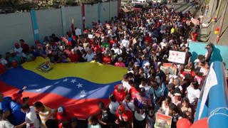 U.S. Strikes Against Venezuela: Trump "Wants the Oil" as Grassroots Resist "Economic Asphyxiation"