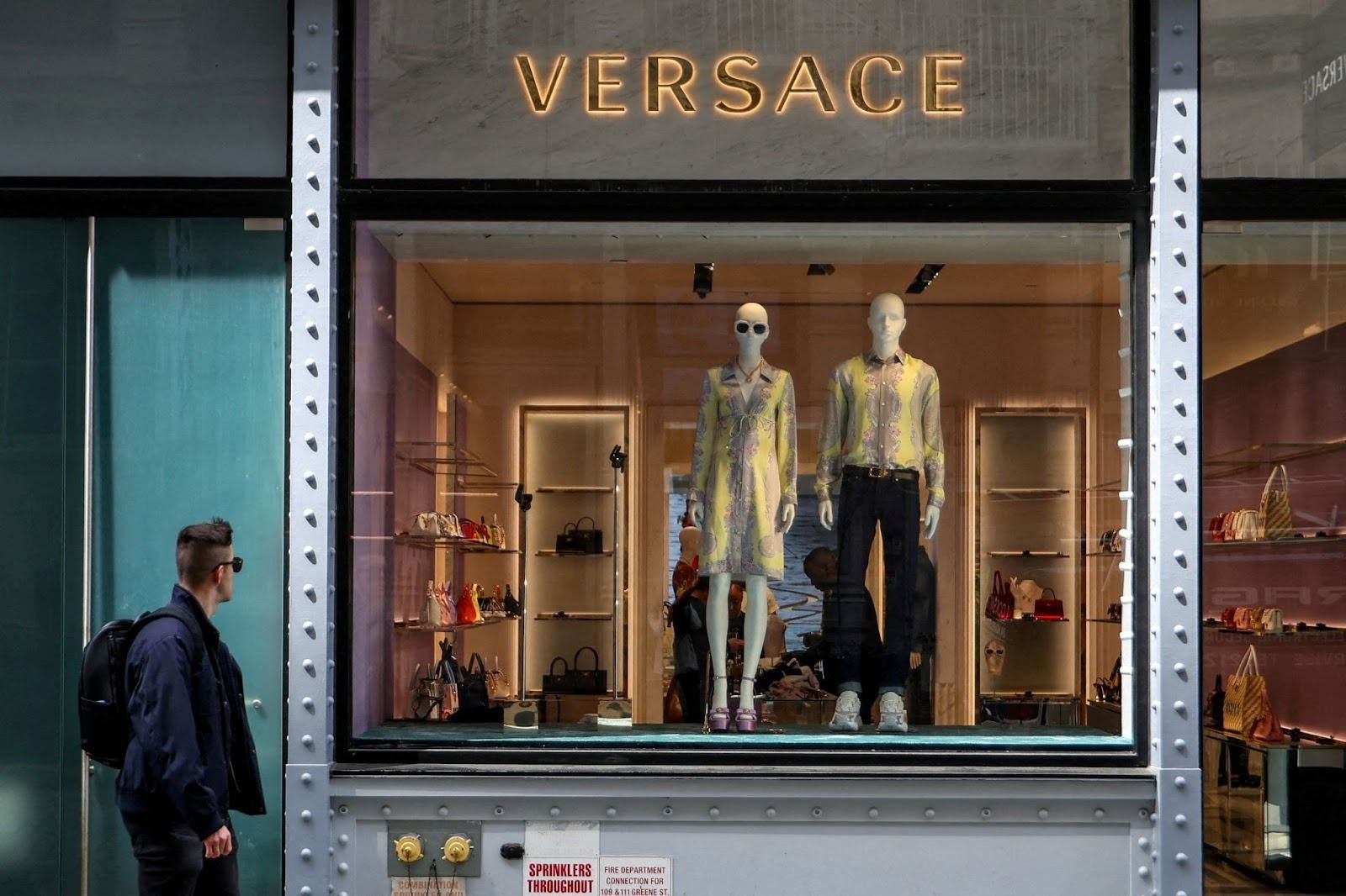 Prada buys Versace amid luxury downturn