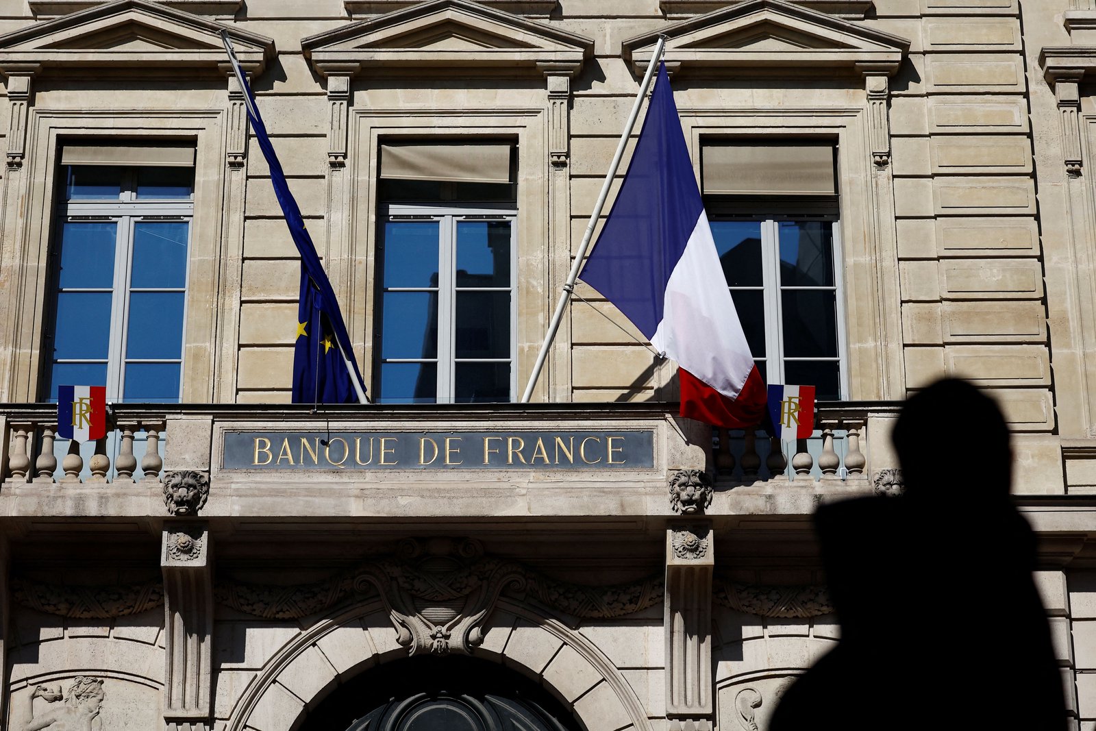 France hit with credit downgrade, as Italy's rating bumped up