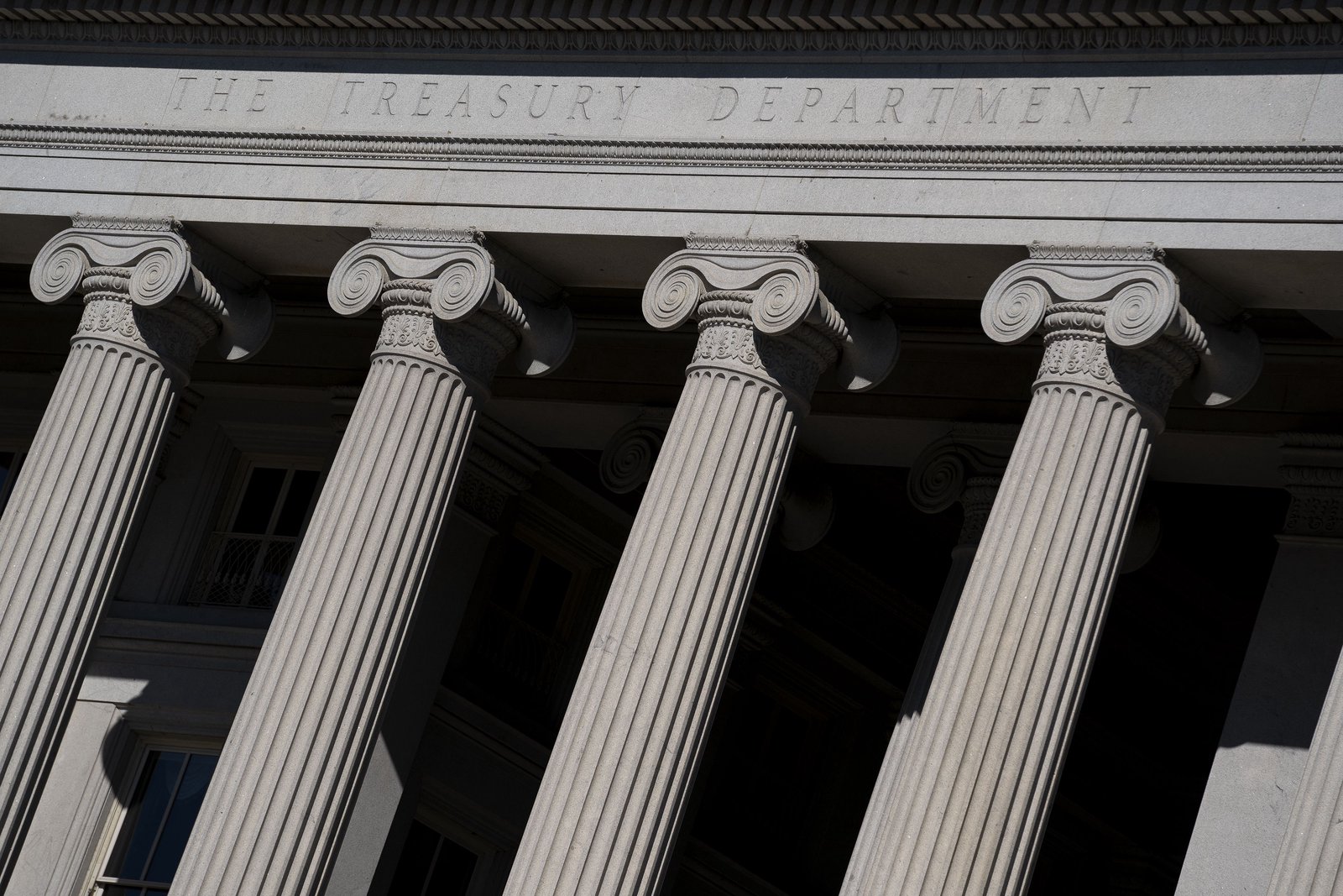 Long-dated government bonds slump worldwide