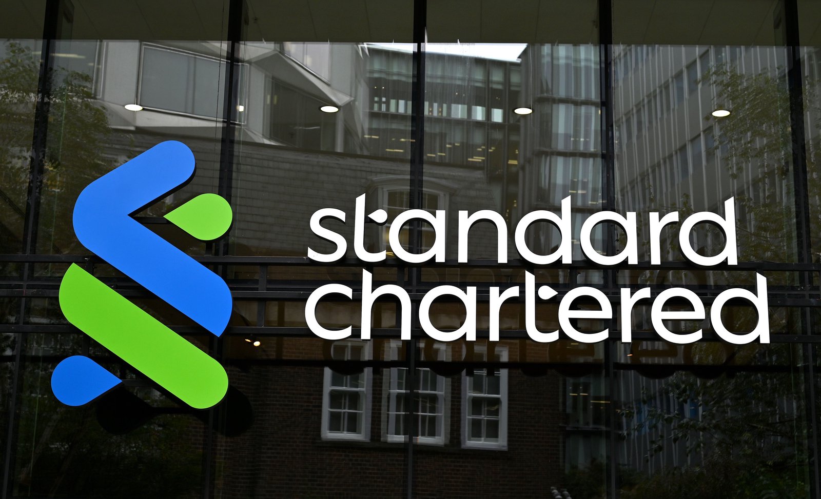 Buy US stocks and gold, Standard Chartered CIO says