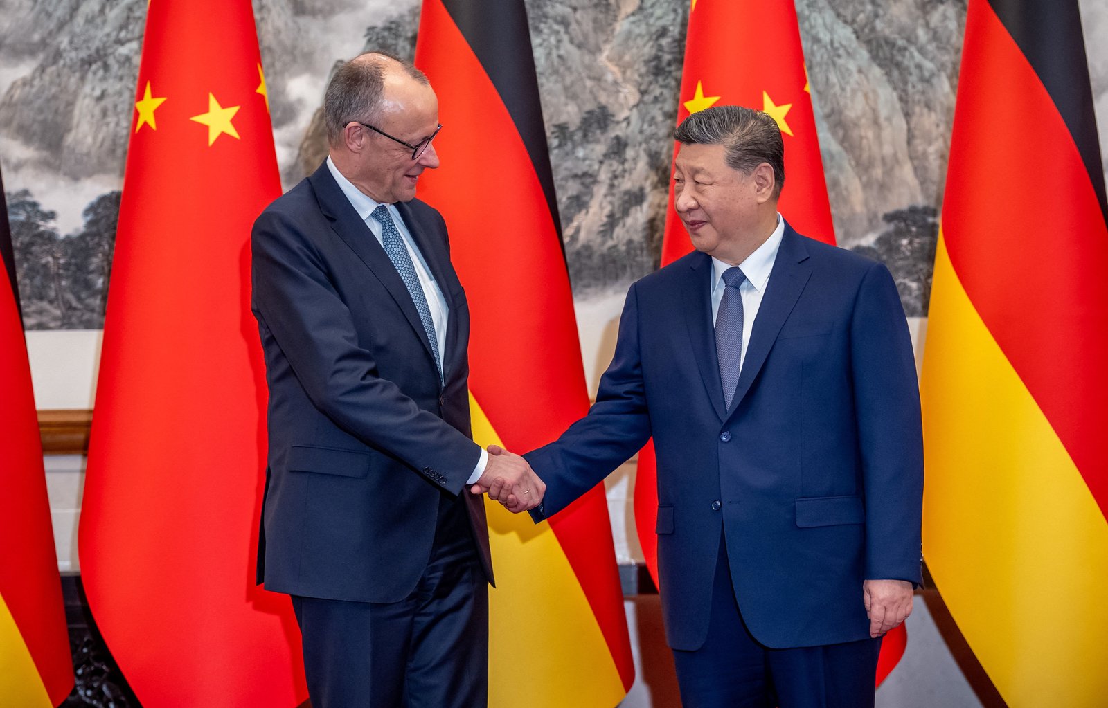 Germany's chancellor walks a tightrope in Beijing