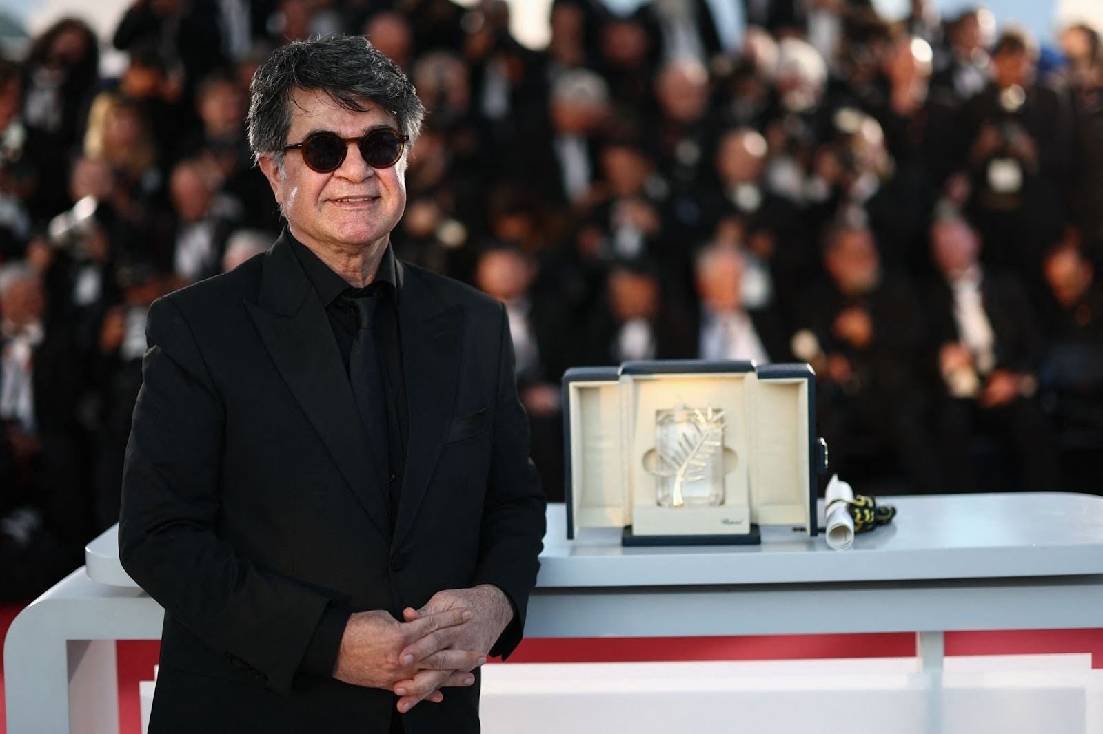 Iran sentences film director to a year in prison in absentia